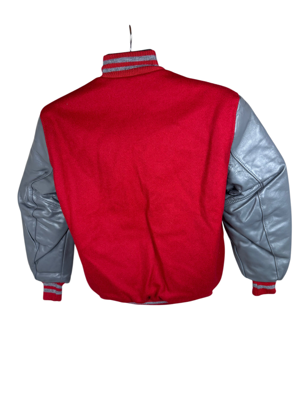 A red and gray varsity-style jacket shown from the back, hanging against a plain white background.