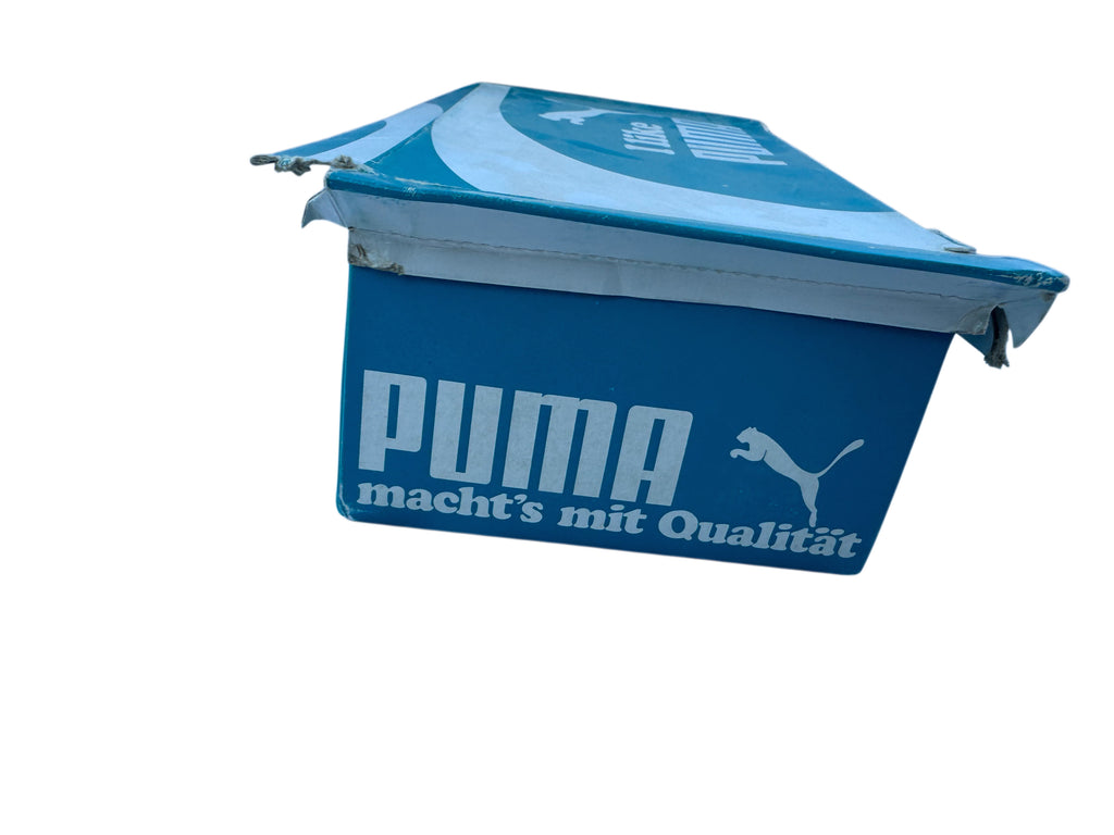 A blue and white Puma branded shoe box on a solid white background.