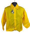A bright yellow long-sleeve utility jacket displayed on a black mannequin torso against a white background, featuring a pointed collar, snap buttons, and a hangtag still attached near the collar.