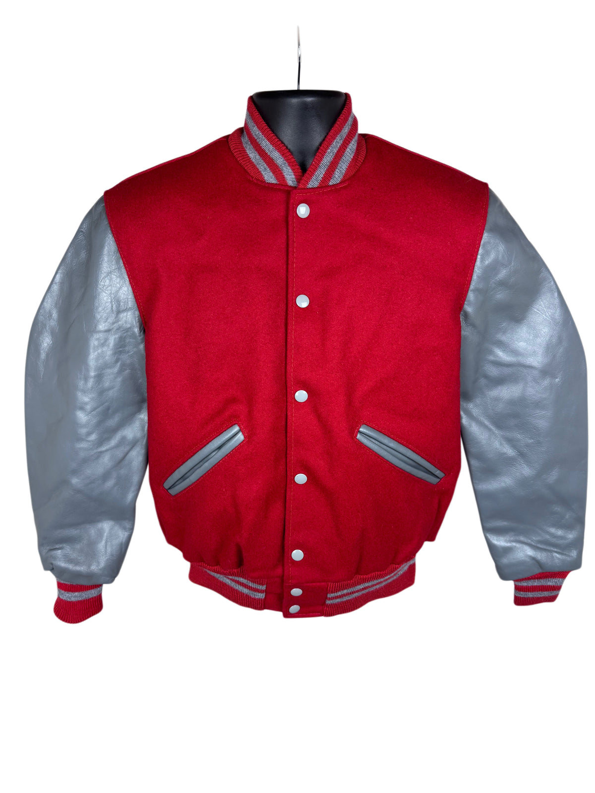 A red and silver varsity jacket displayed on a black mannequin torso against a plain white background.