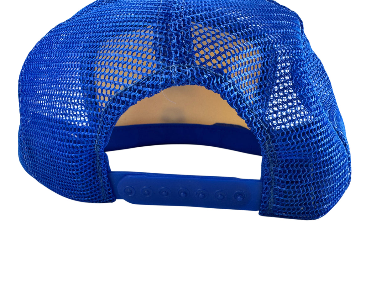 Close-up rear view of a blue trucker-style cap with a mesh back and adjustable snap strap, shown on a white background.