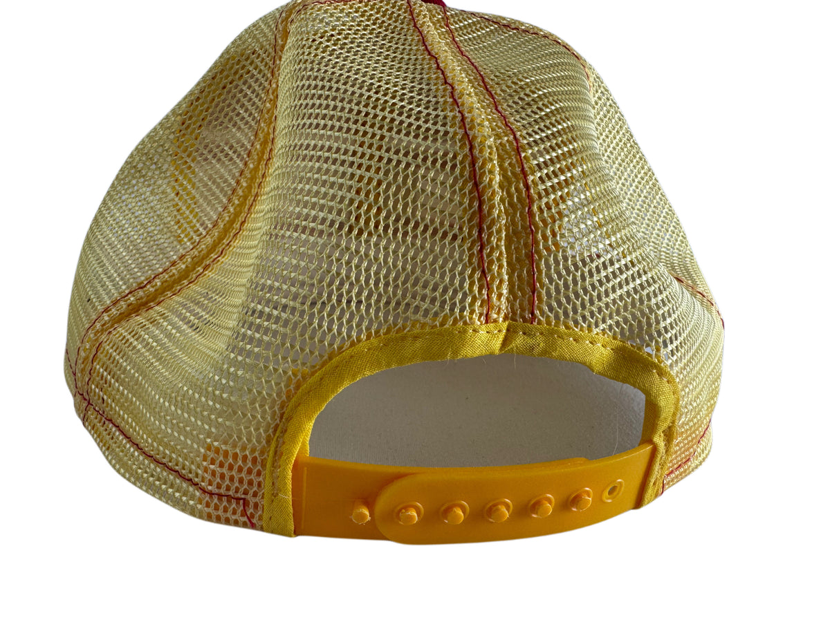 A close-up rear view of a baseball cap with a yellow mesh back, yellow embroidered stitching, and a yellow plastic snapback closure.