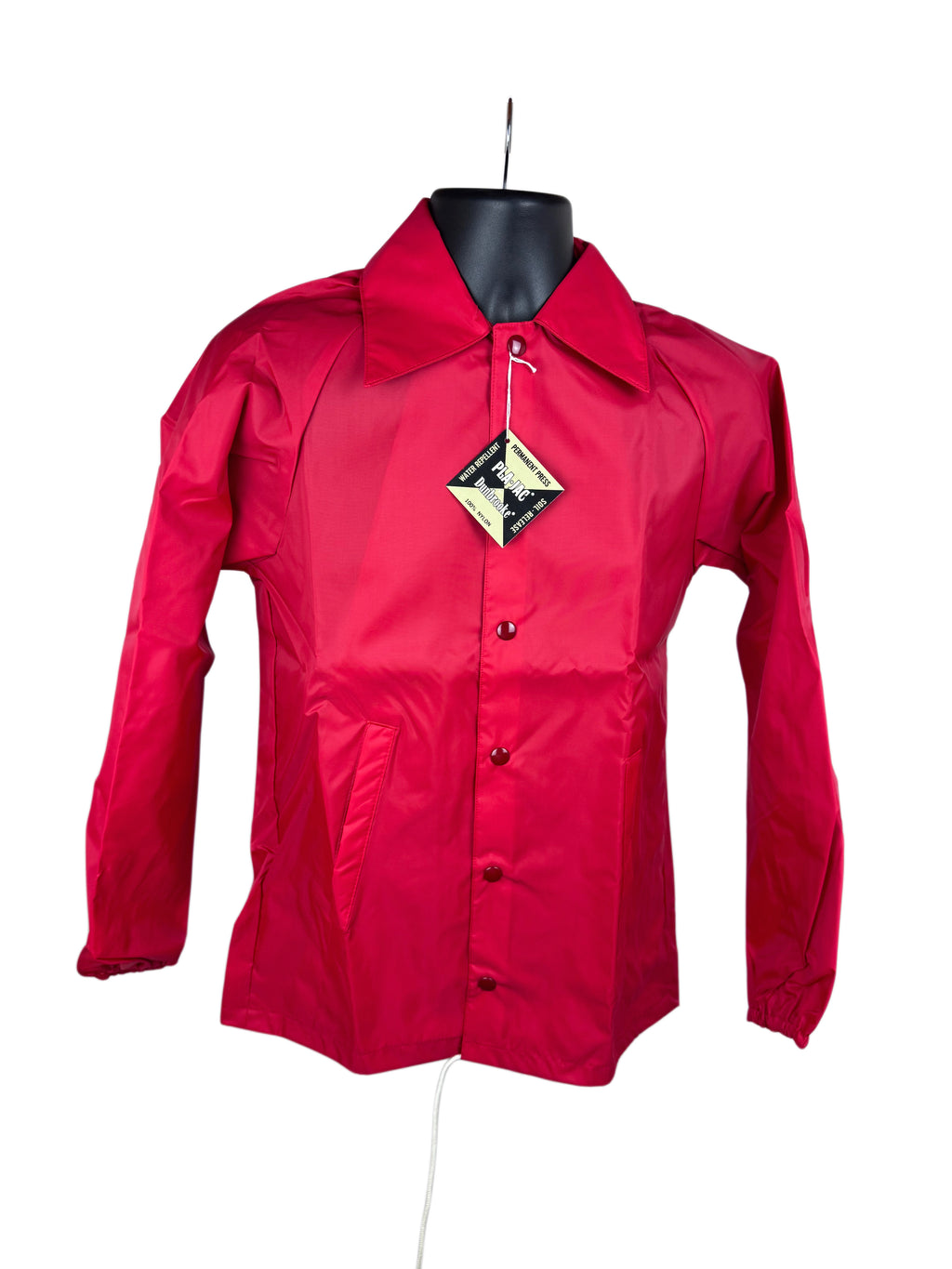 A bright red long-sleeve snap front jacket displayed on a black mannequin torso against a plain white background, with a hangtag attached at the collar.